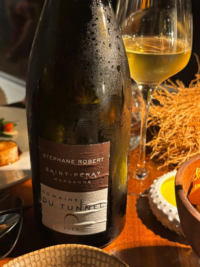 A bottle of wine Stéphane Robert / Domaine du Tunnel.