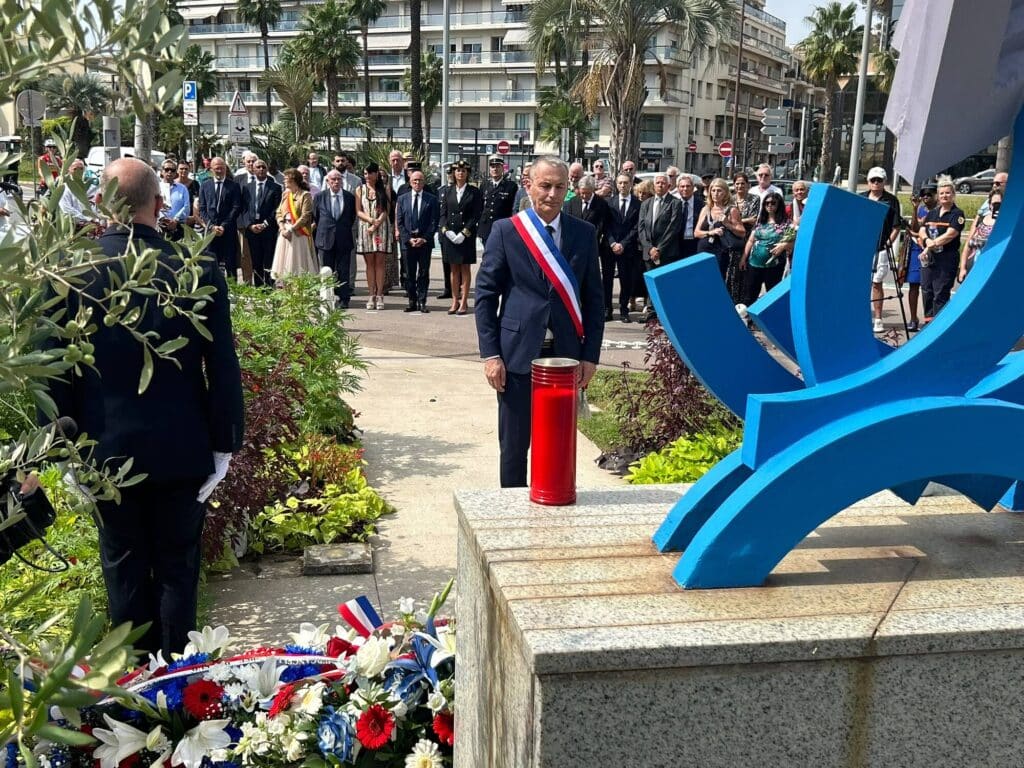 Charles Voglimacci, deputy mayor of Ajaccio in front of the stele after laying the flower wreath