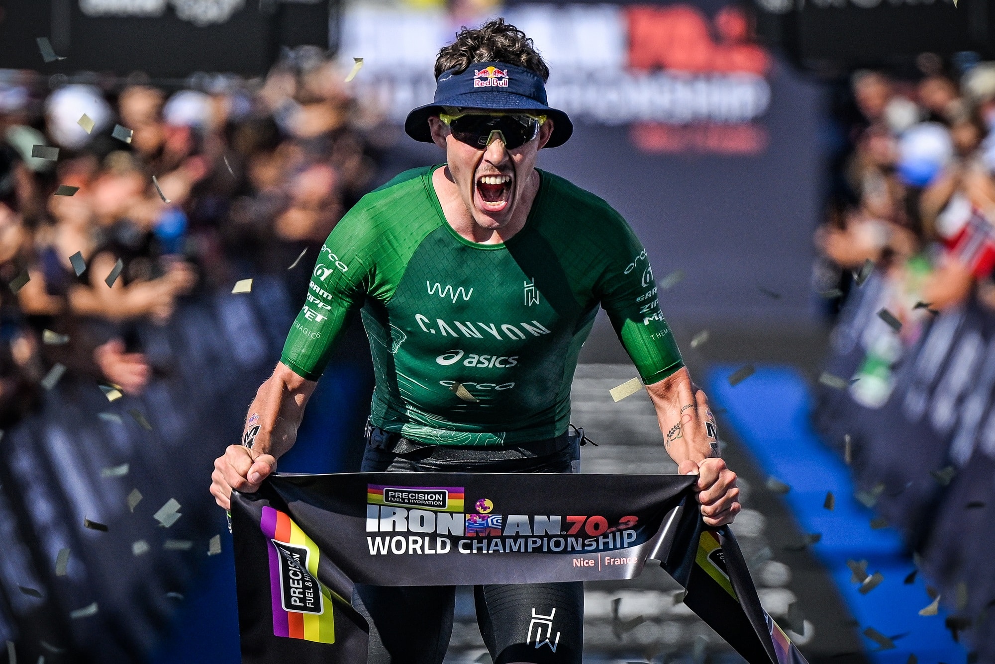 Hayden Wilde explodes with joy at the finish of Ironman 2026
