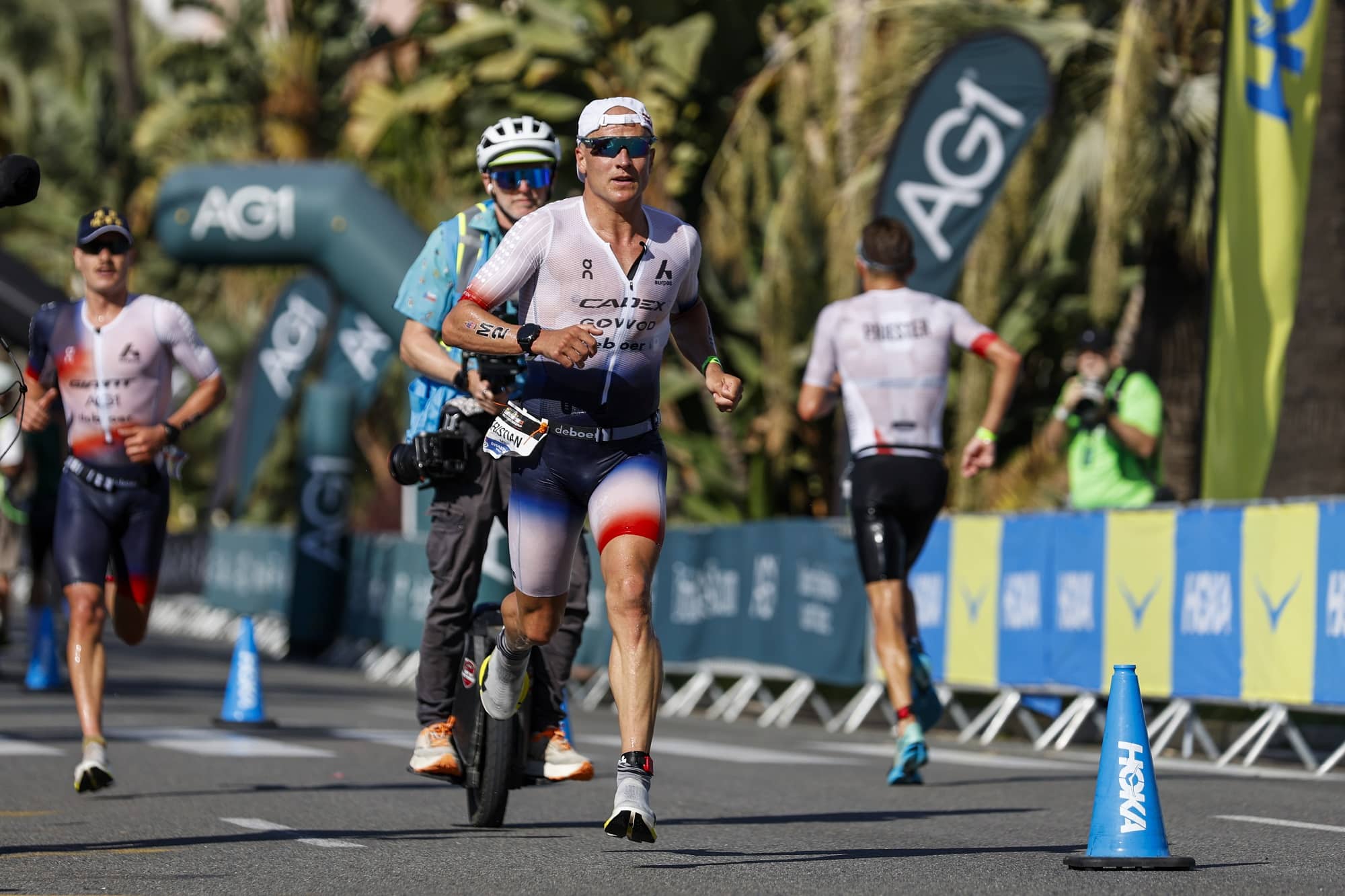 Two Ironman Nice athletes running.