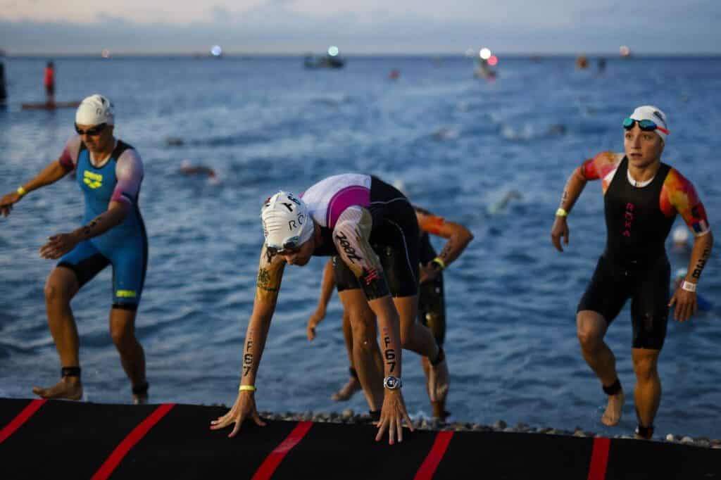 An athlete comes out of the water