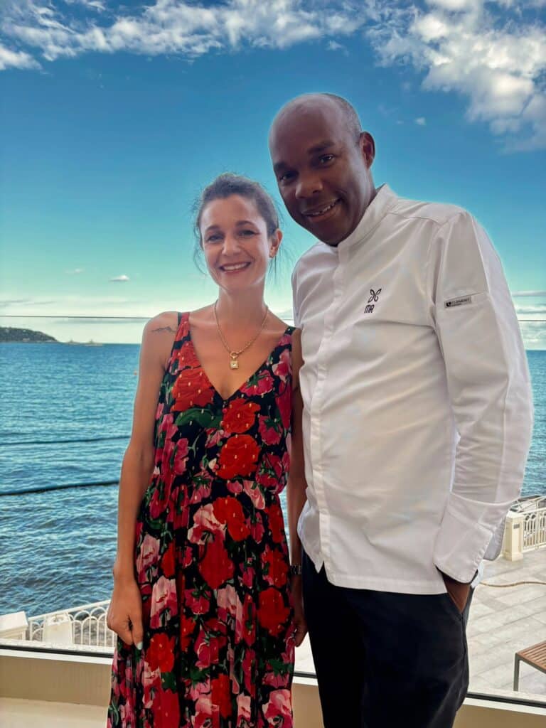 Chef Maurice Ravin with Célia facing the sea.