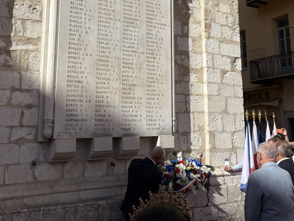 The laying of wreaths at the War Memorial in front of the Sainte Réparate Cathedral.