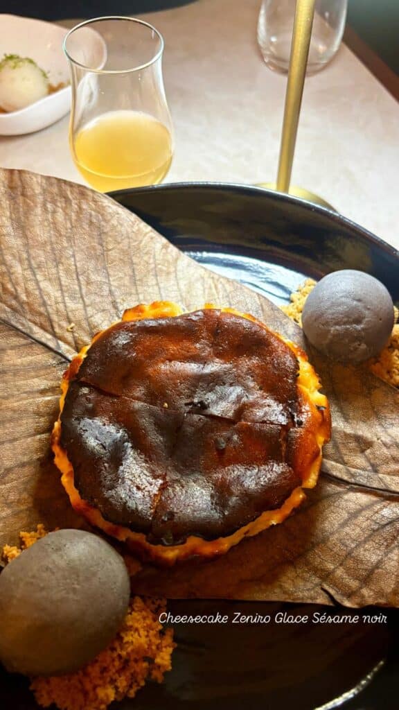 A cheesecake with black sesame ice cream.